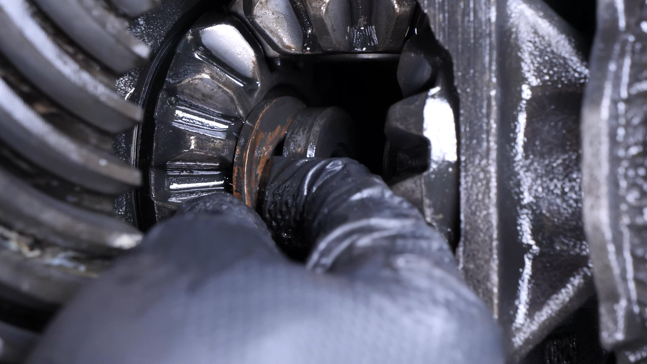 Disengage the rear axle shaft from the differential
