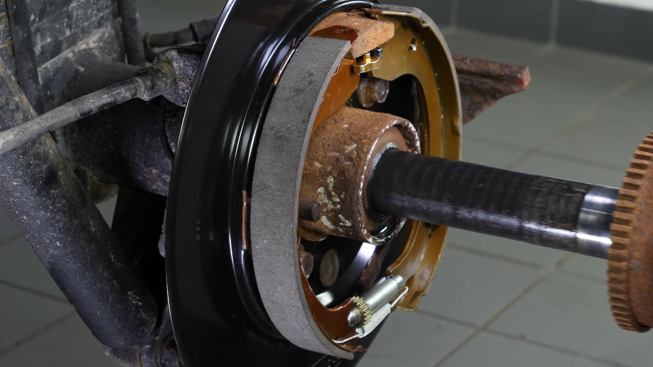 Disengage the rear axle shaft from the differential