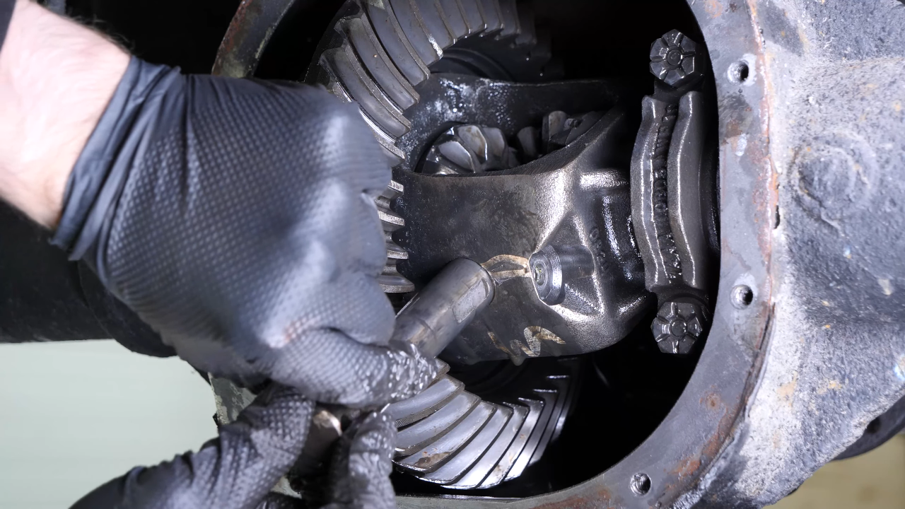Put the rear axle shaft back