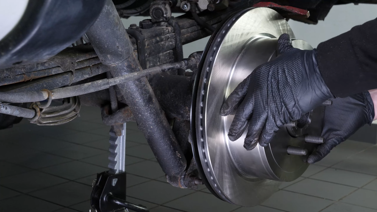 Put the rear brake system back