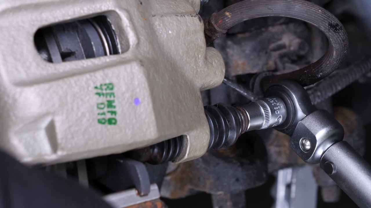 Put the rear brake system back