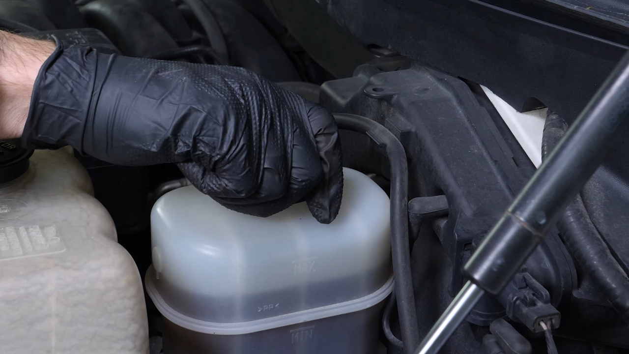 Open the brake fluid reservoir