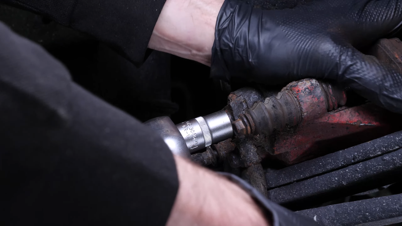 Remove the brake hose from the caliper