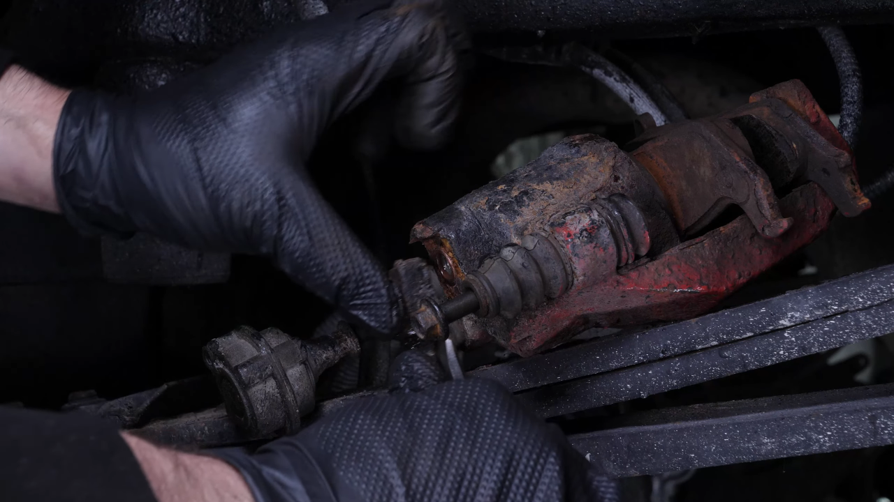 Remove the brake hose from the caliper