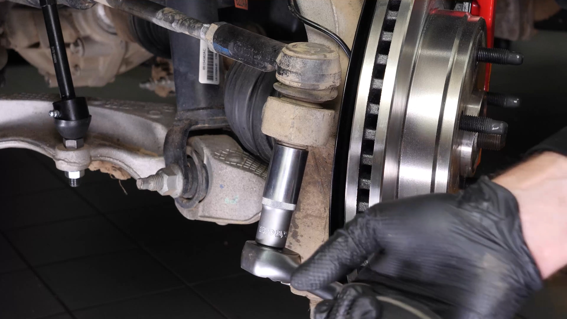 Loosen the holding nut