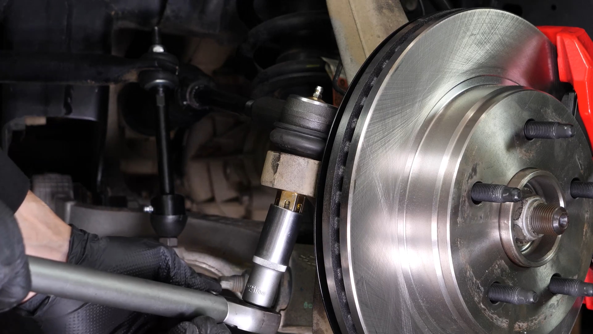 Install the outer tie rod holding nut