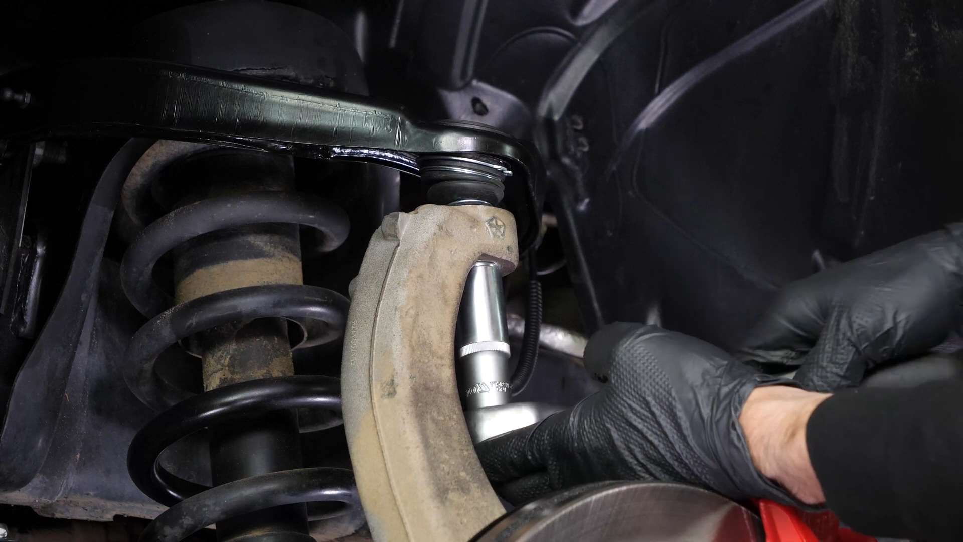 Remove the control arm ball joint