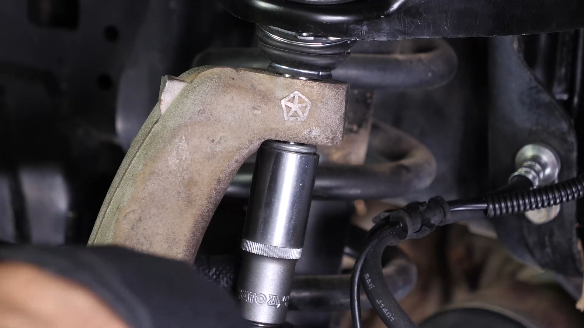 Remove the control arm ball joint