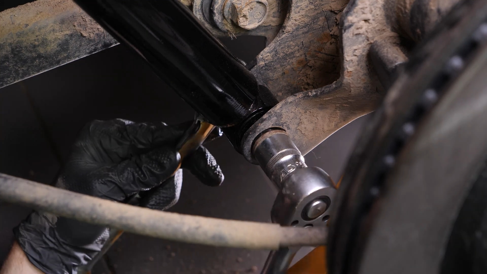 Install the new shock absorber