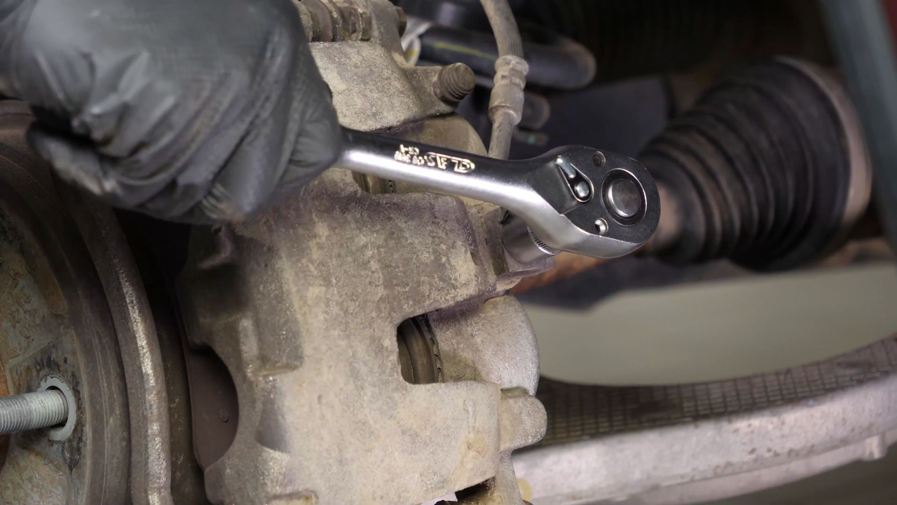 Loosen the brake hose