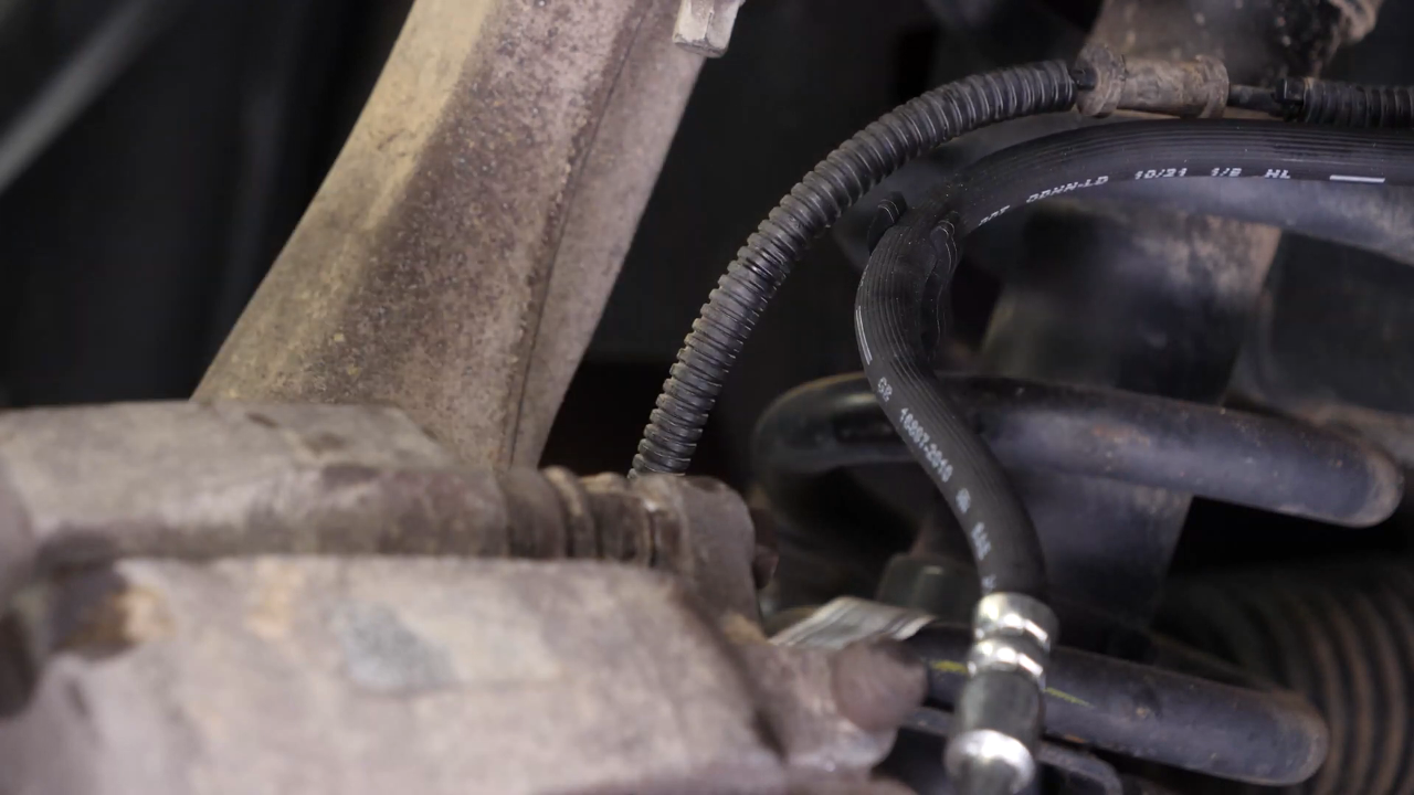 Screw the brake hose back on the caliper