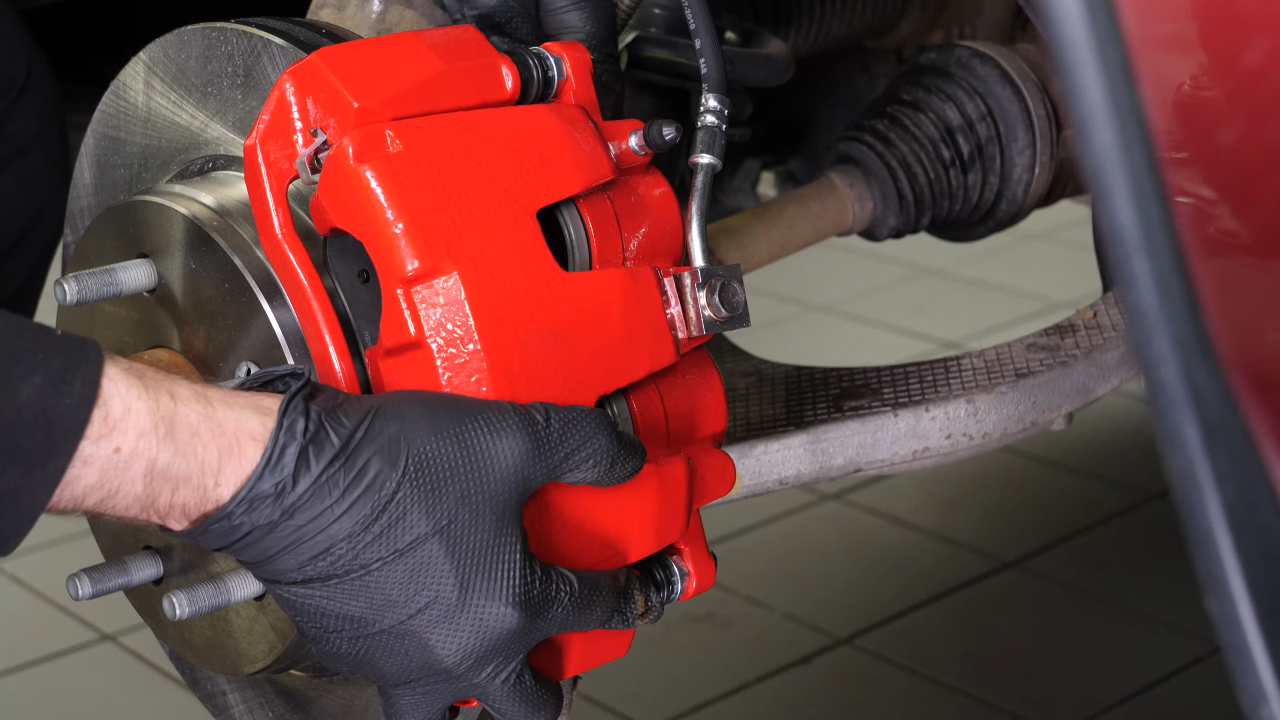 Install the caliper assembly