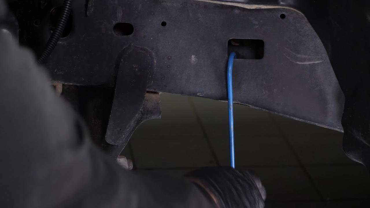 Remove the caliper assembly