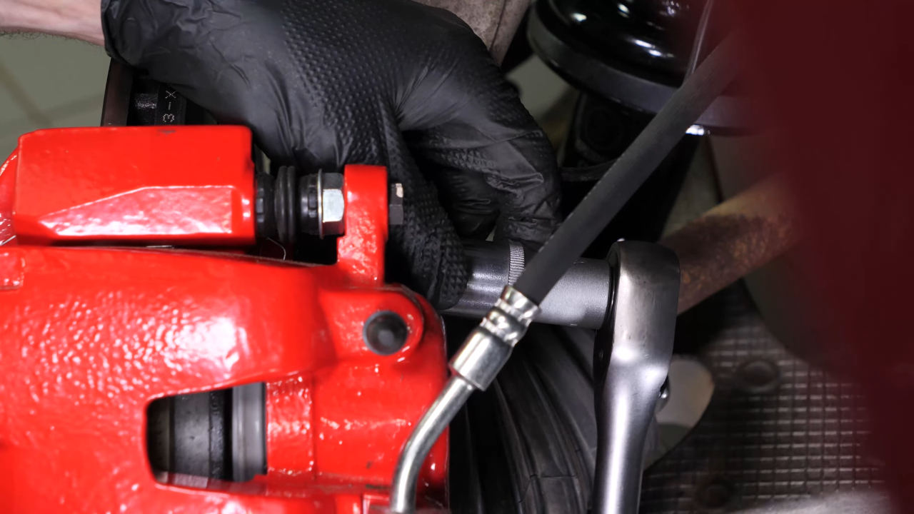 Remove the caliper assembly