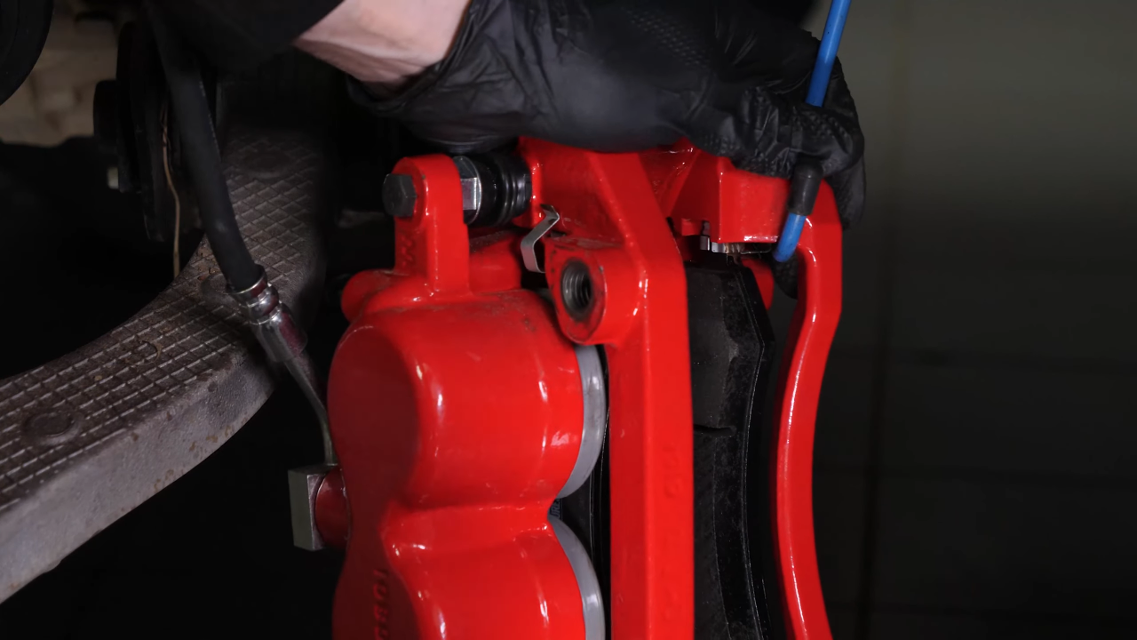 Remove the caliper assembly