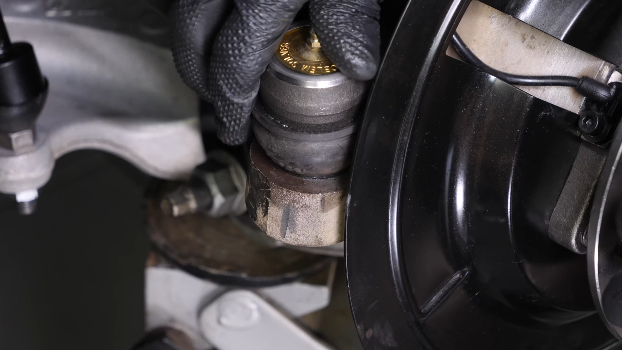 Put the outer tie rod back