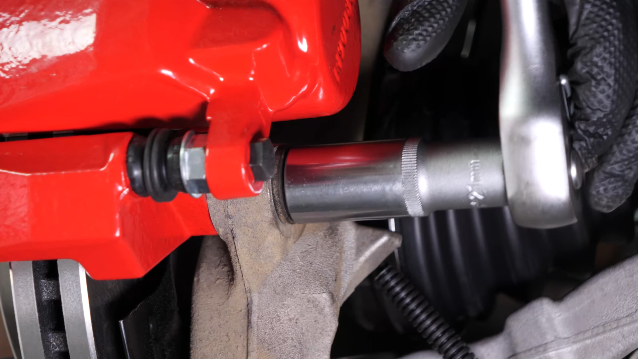 Put the caliper assembly back