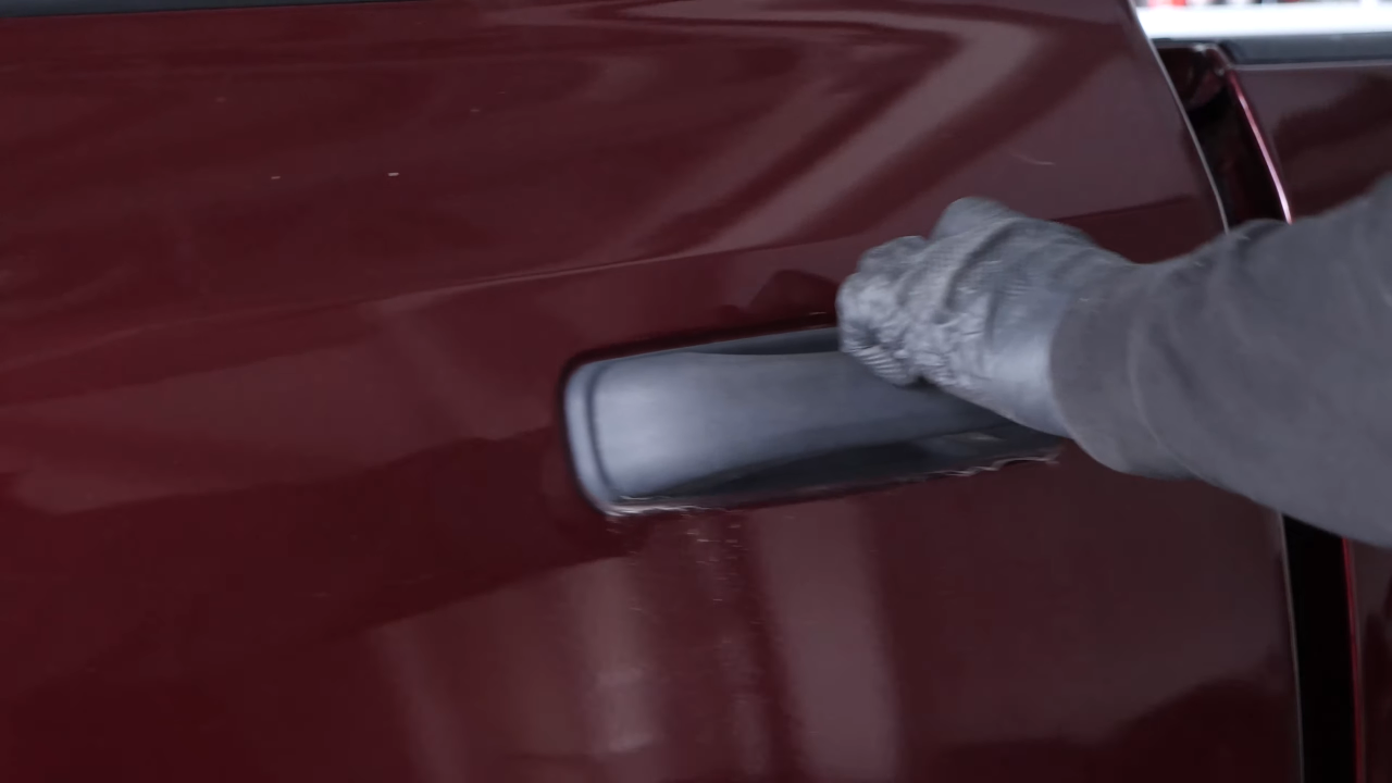 Unscrew the screw inside the door