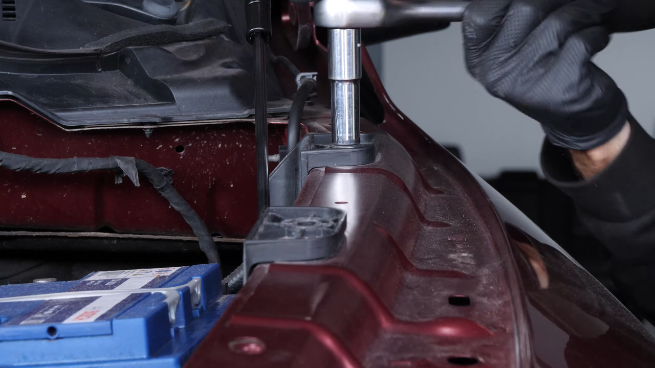 Unscrew the screw inside the door