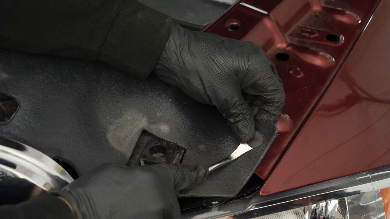 Remove the grille assembly, the healdights and bumper cover