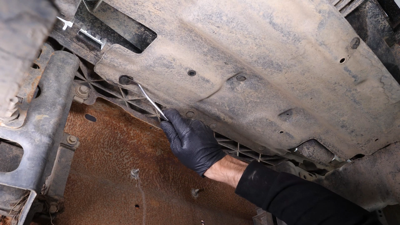 Remove the bumper cover plastic fastener
