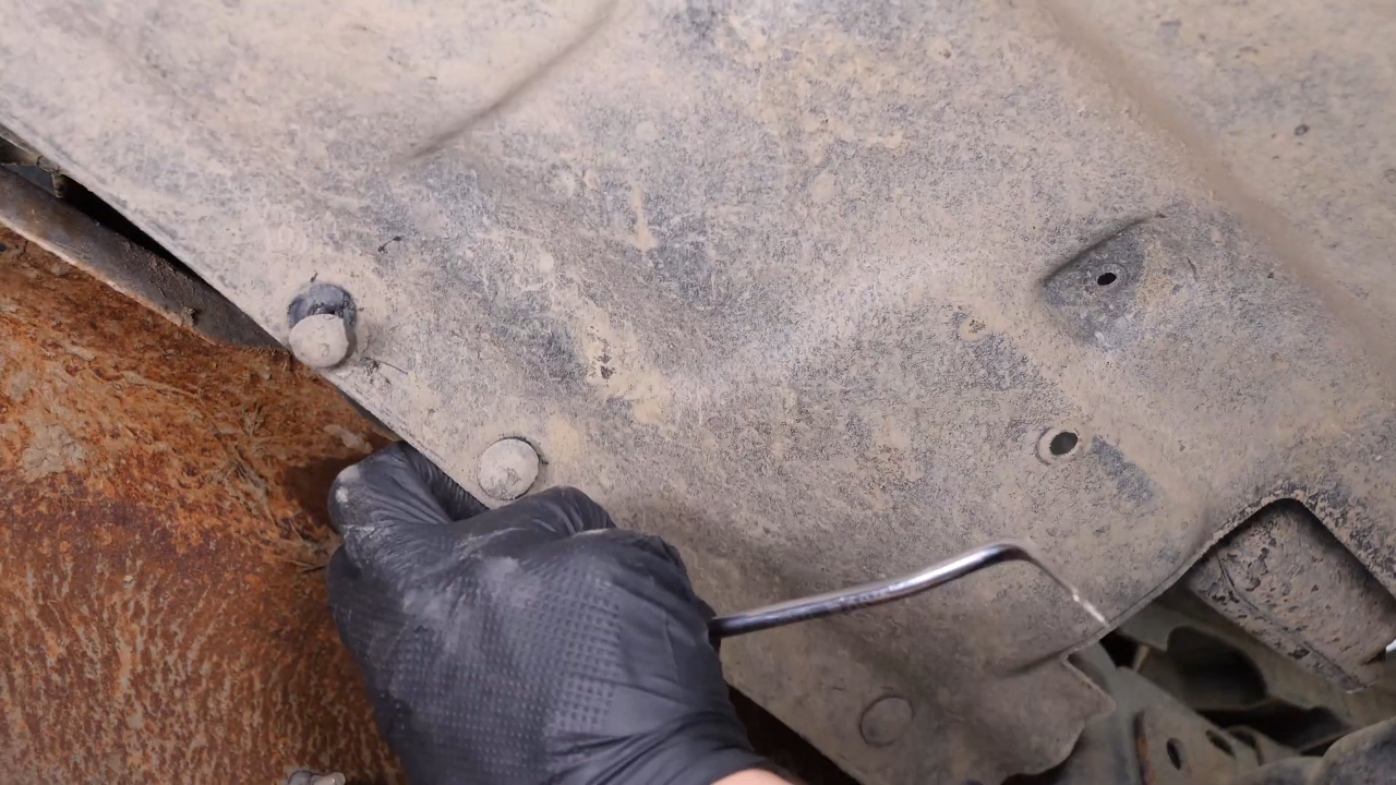 Remove the bumper cover plastic fastener