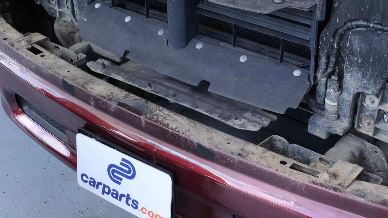 Remove the bumper cover plastic fastener