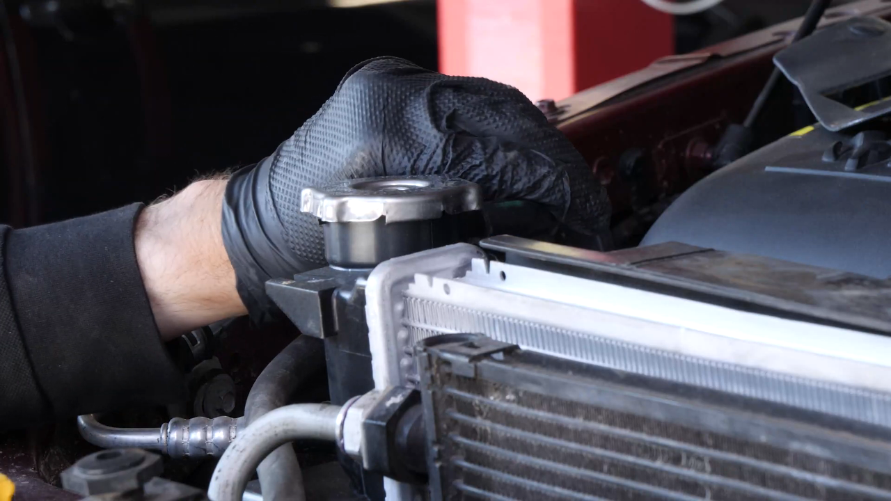 Remove the coolant reservoir
