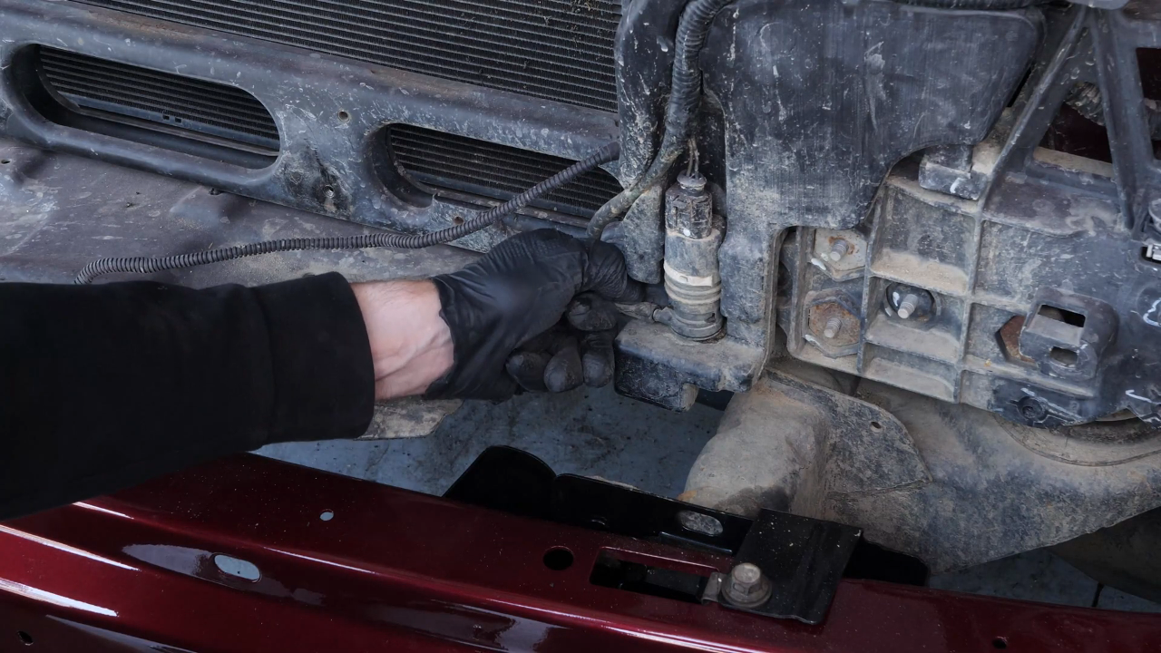 Remove the washer pump fluid reservoir