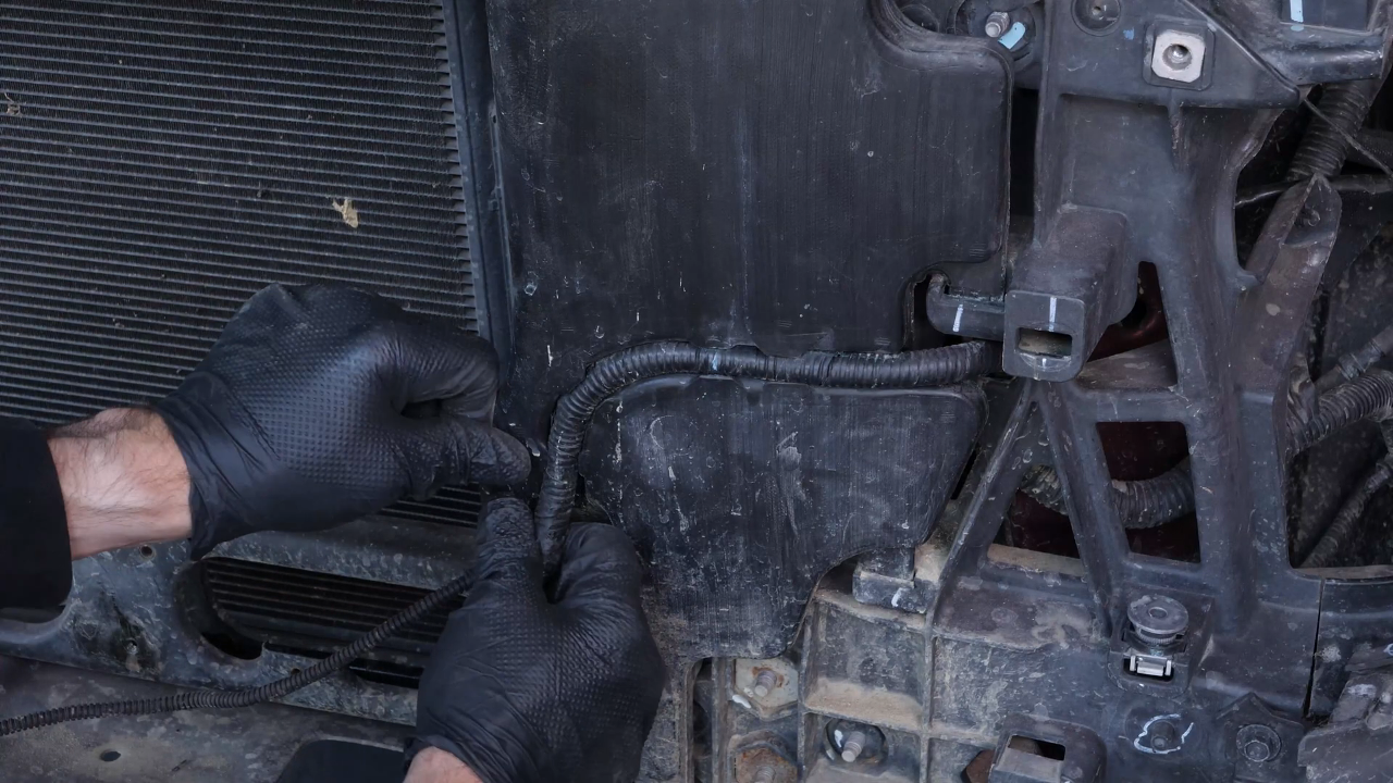 Remove the washer pump fluid reservoir