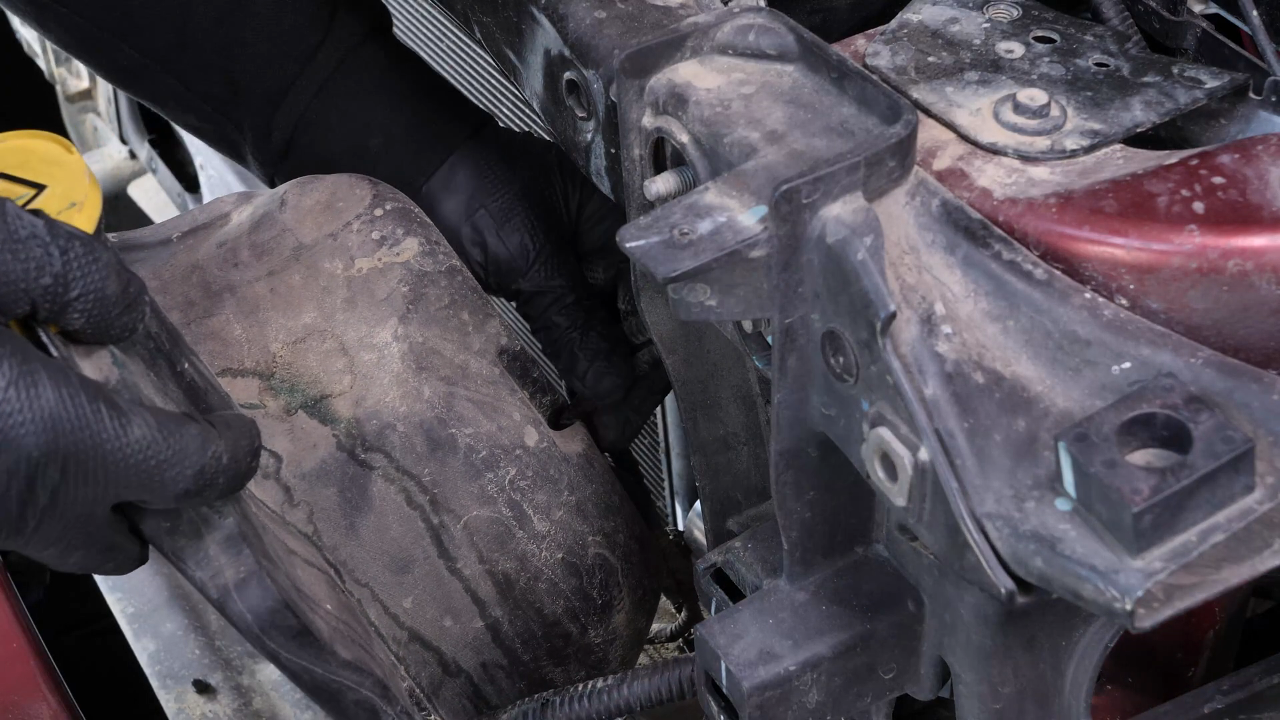 Remove the washer pump fluid reservoir