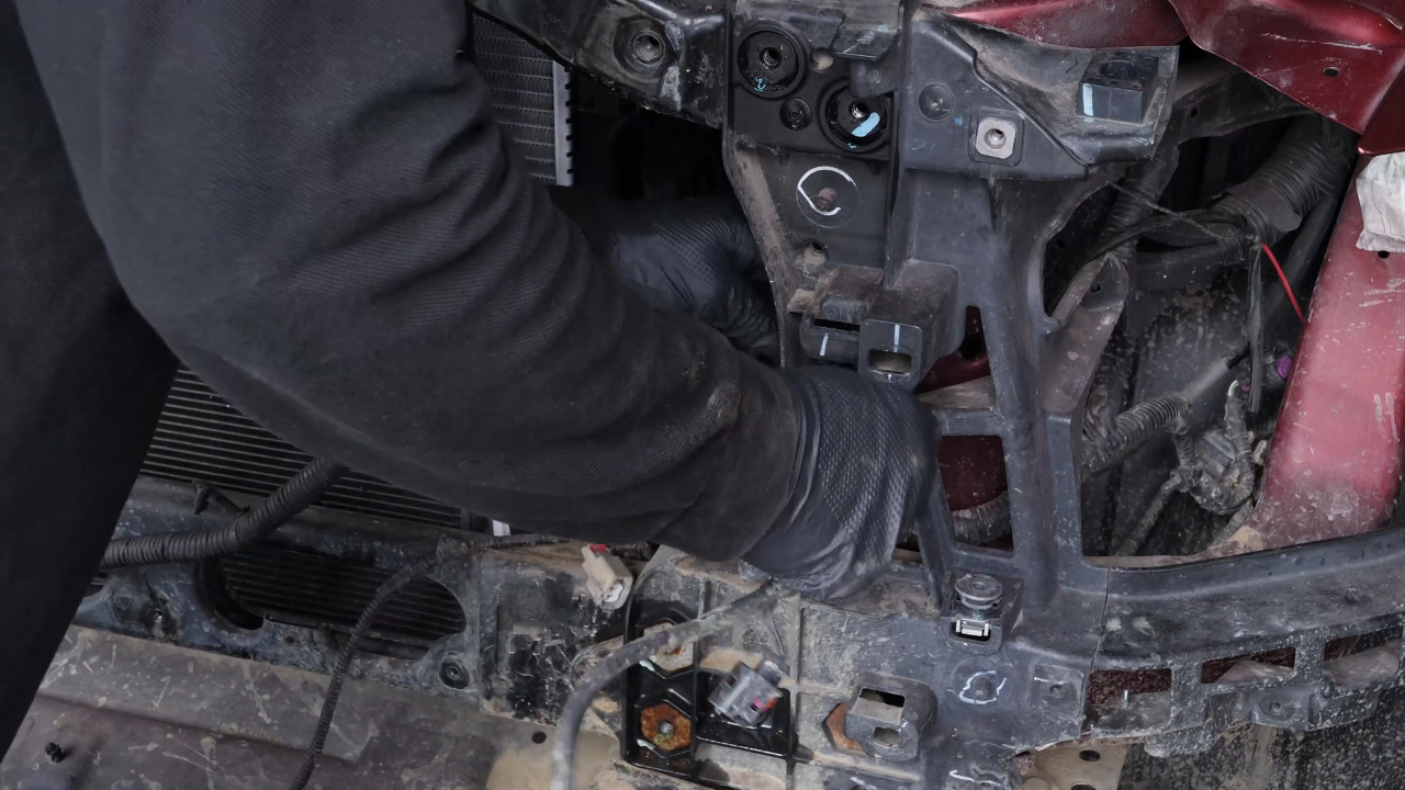 Remove the radiator bracket