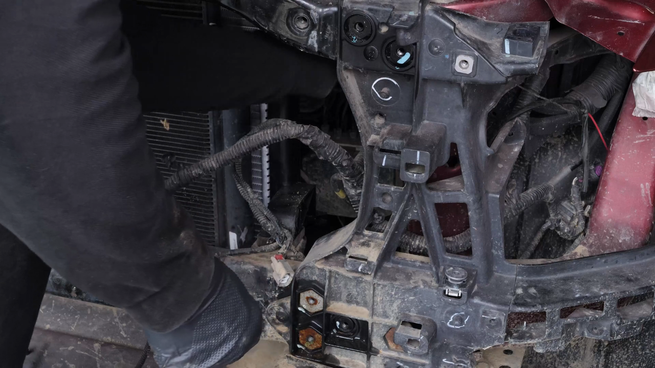 Remove the radiator bracket