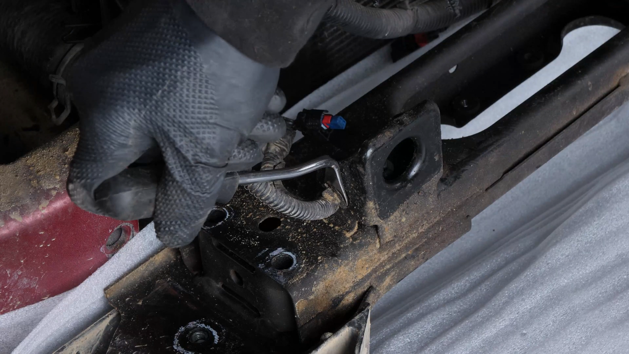 Remove the radiator bracket