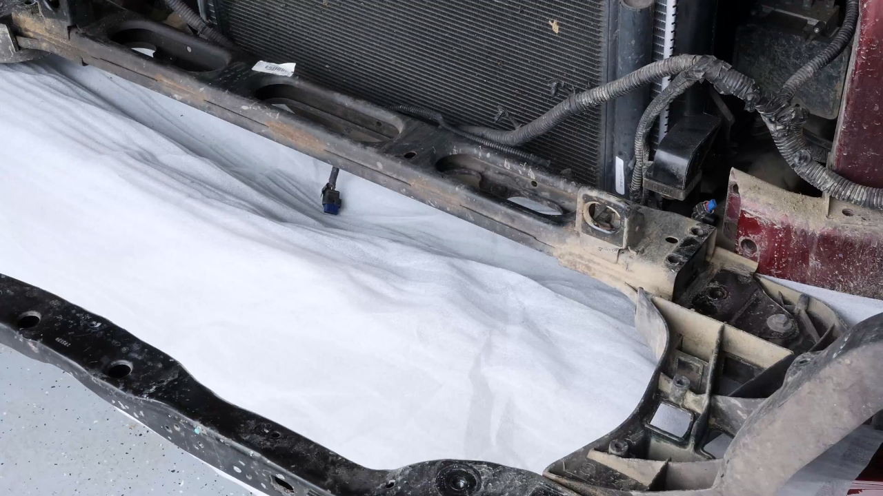 Remove the radiator bracket