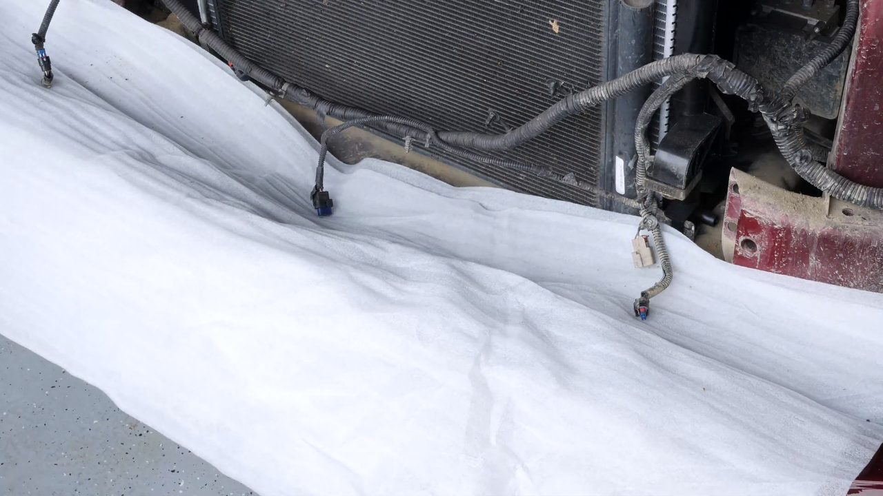 Remove the radiator bracket