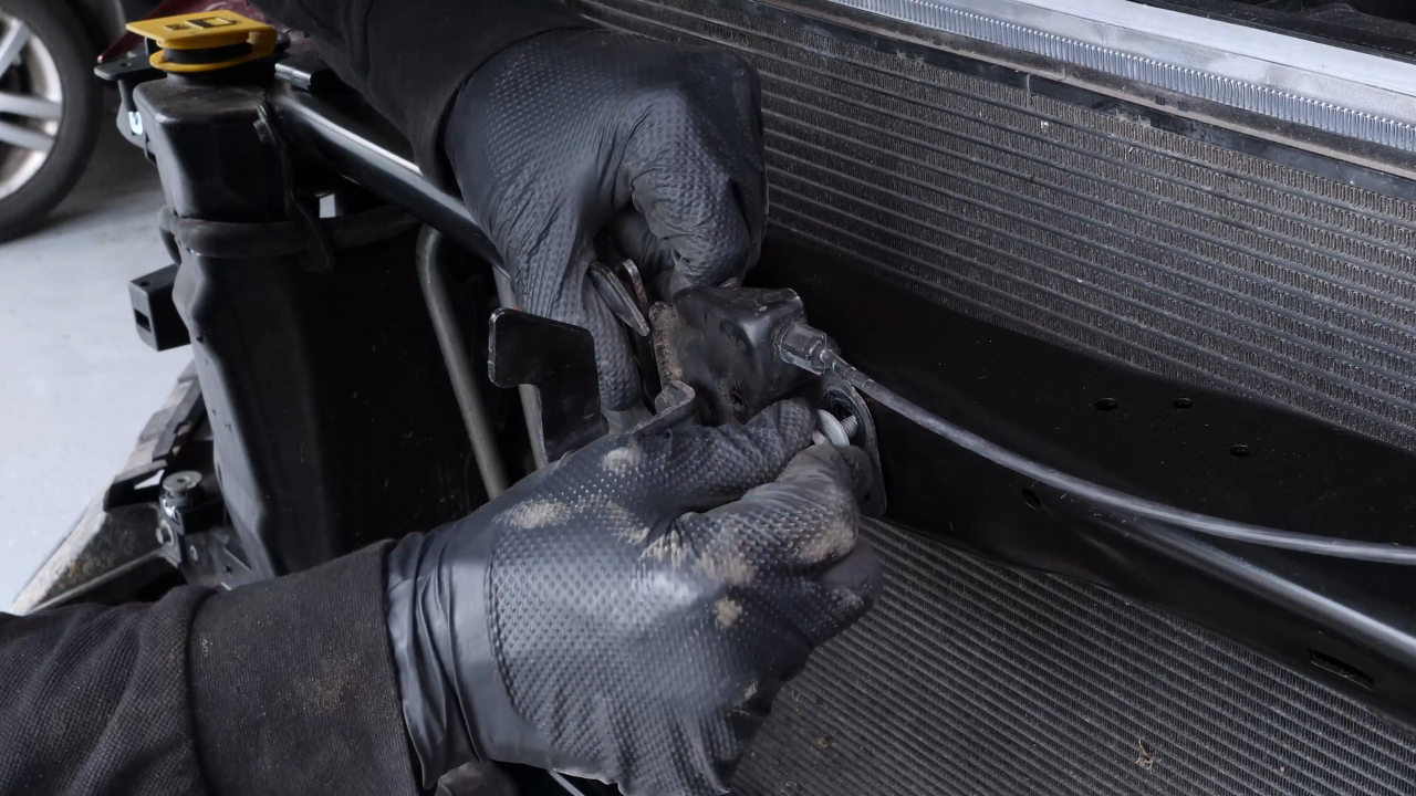 Put the hood latch back