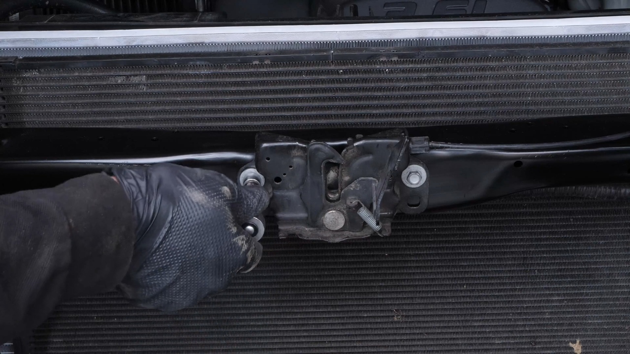 Put the hood latch back