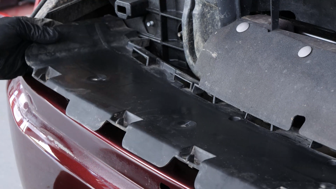 Put the grille assembly, the healdights and bumper cover back
