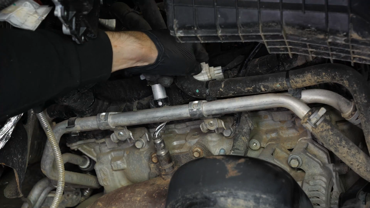 Disconnect the oxygen sensor