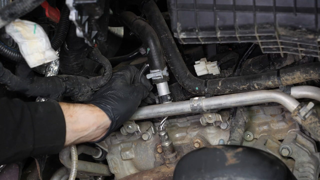 Disconnect the oxygen sensor