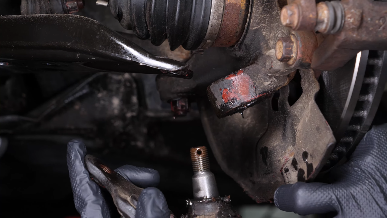 Separate the ball joint from the control arm 