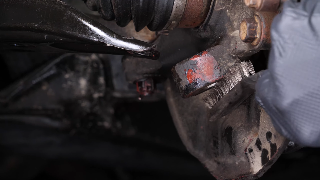 Separate the ball joint from the control arm 