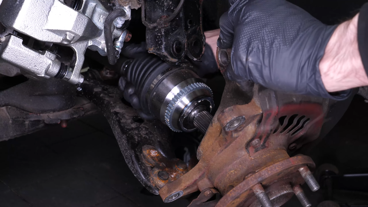 Remove the wheel knuckle