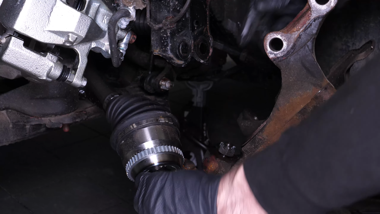 Remove the wheel knuckle