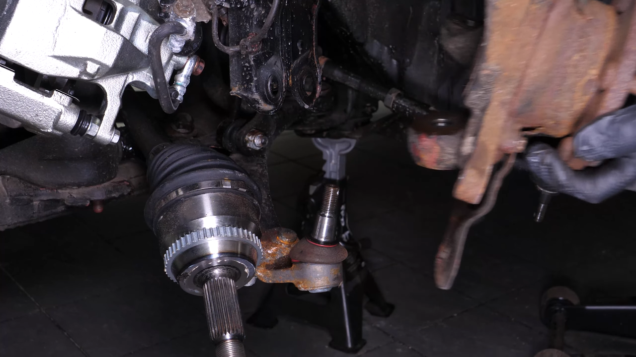 Remove the wheel knuckle