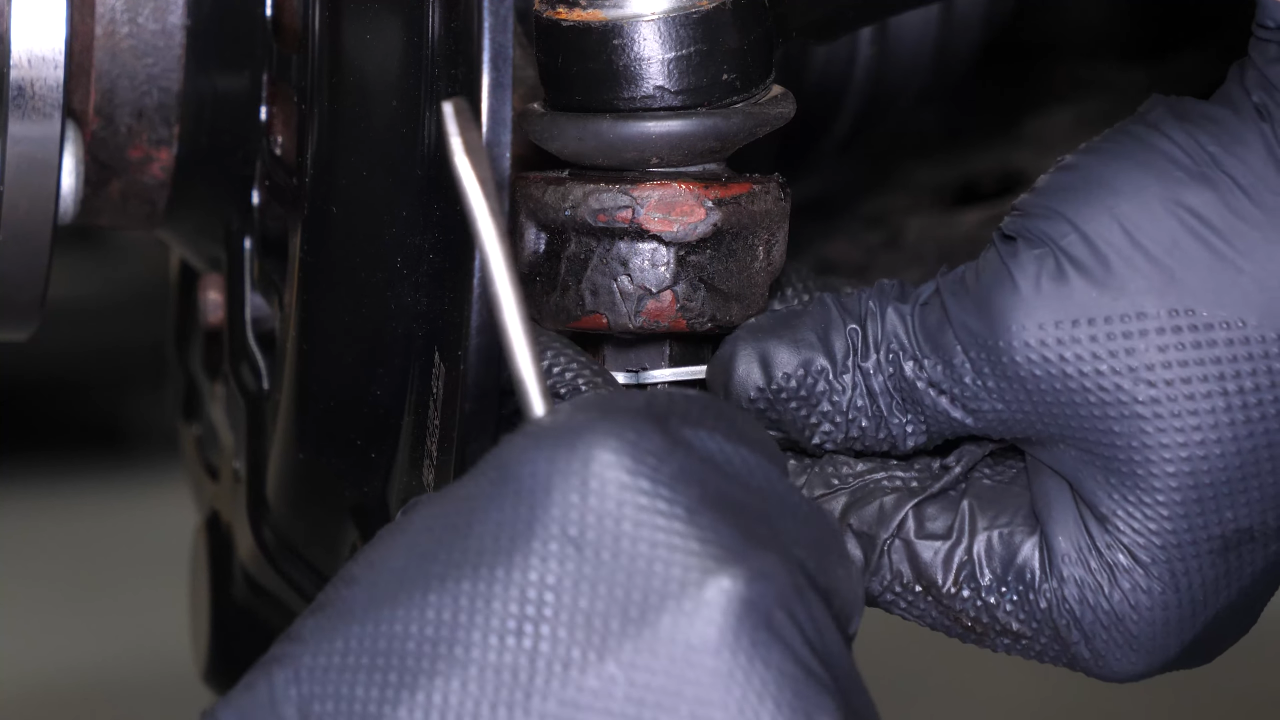 Put the outer tie rod back