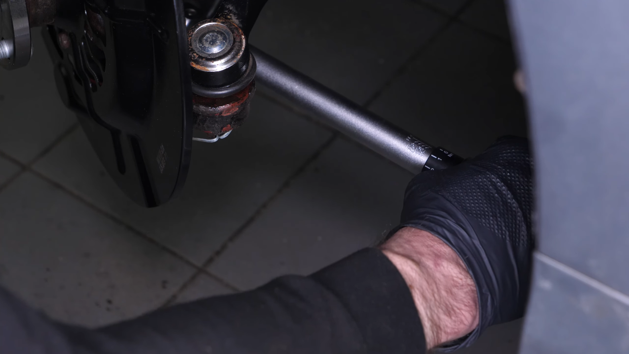 Put the outer tie rod back