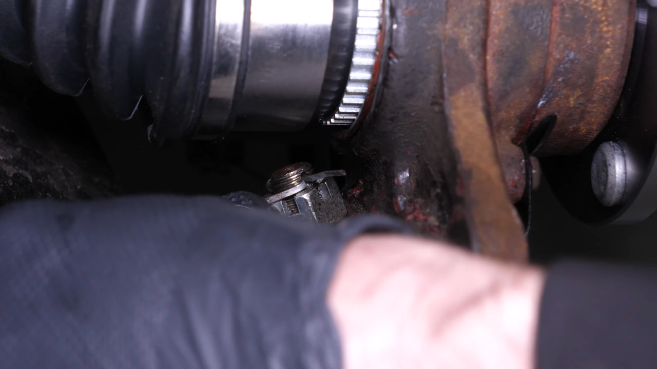 Put the outer tie rod back