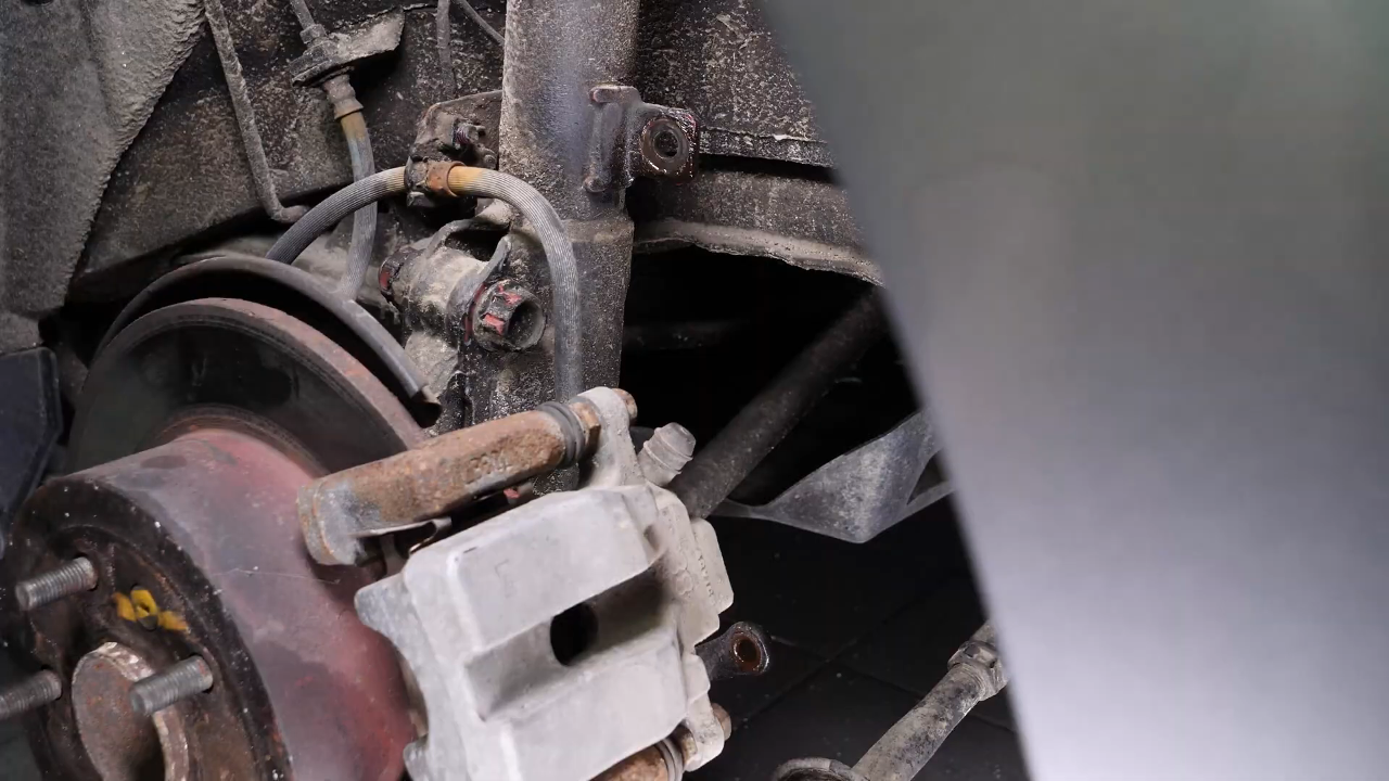 Remove the upper ball joint